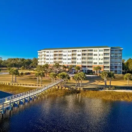 Buy this 4 bed condo on 7287 Seaside Road Southwest in Sunset Beach, Brunswick County
