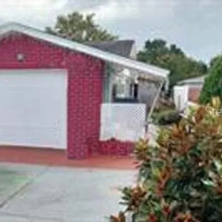 Buy this 2 bed house on 7138 Potomac Drive in Jasmine Estates, FL 34668