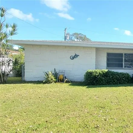 Buy this 3 bed house on 1460 Saturn Street in Merritt Island, FL 32953