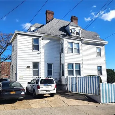 Buy this 8 bed house on 162-01 87th Road in New York, NY 11432