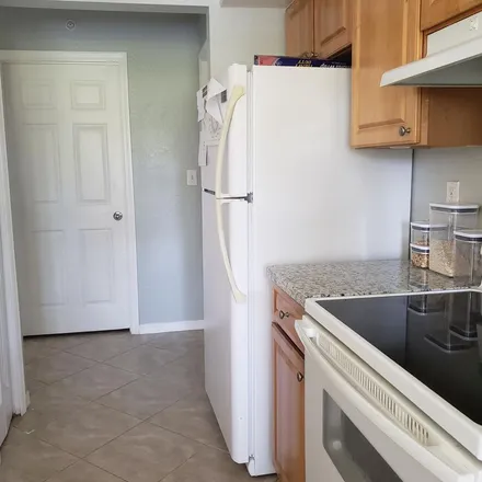 Rent this 1 bed apartment on Michelangelo Boulevard in Palm Beach County, FL 33446