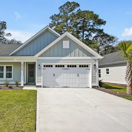 Buy this 4 bed house on 2079 Greenside Manor Dr Sw in Ocean Isle Beach, North Carolina