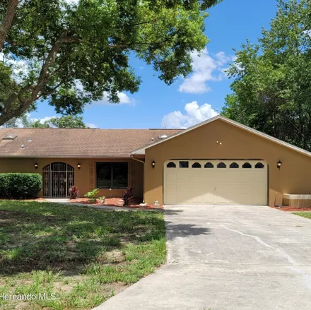 Buy this 2 bed house on 3078 Fisher Avenue in Spring Hill, FL 34609