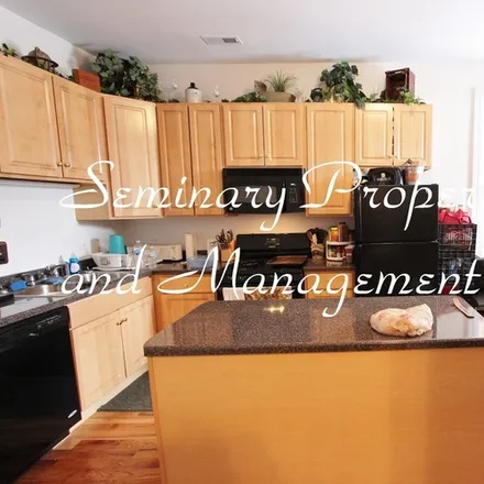 Rent this 2 bed apartment on 3648 N Lakewood Ave