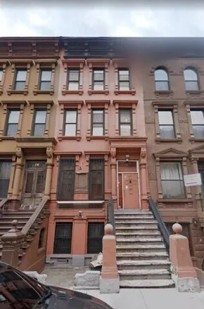 Buy this 8 bed townhouse on 12 West 131st Street in New York, NY 10037