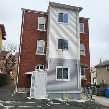 Rent this 3 bed apartment on 11 Erwin Place in New Britain, CT 06051