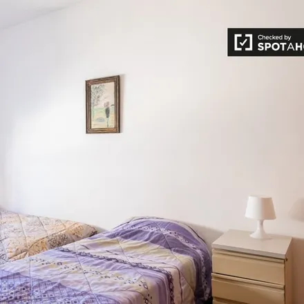 Rent this 6 bed room on Rua Pedro Nunes 9 in 1050-170 Lisbon, Portugal