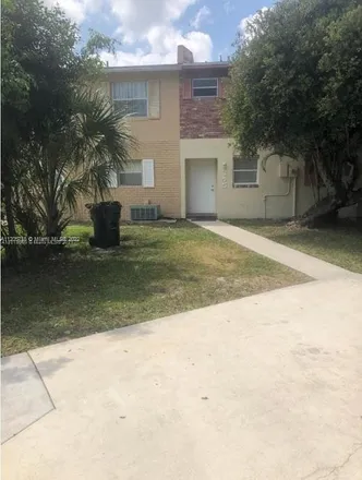 Buy this 3 bed townhouse on 345 Sunshine Drive in Coconut Creek, FL 33066