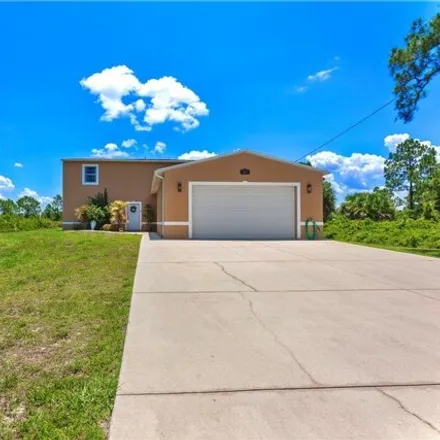 Buy this 4 bed house on 414 Leroy Ave in Lehigh Acres, Florida