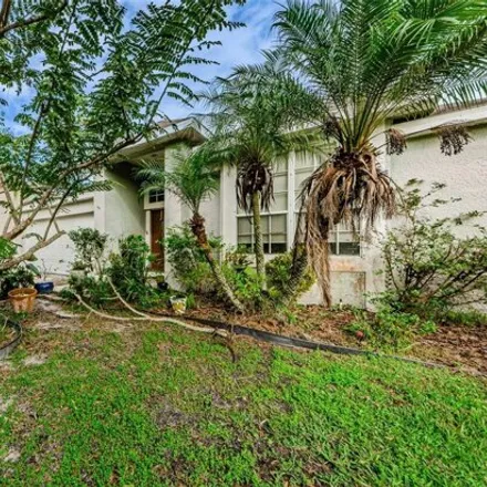 Buy this 3 bed house on 4931 Ridgemoor Cir in Palm Harbor, Florida