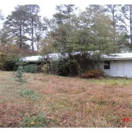 Buy this studio house on 1286 East 3rd Avenue in Foreman, Little River County