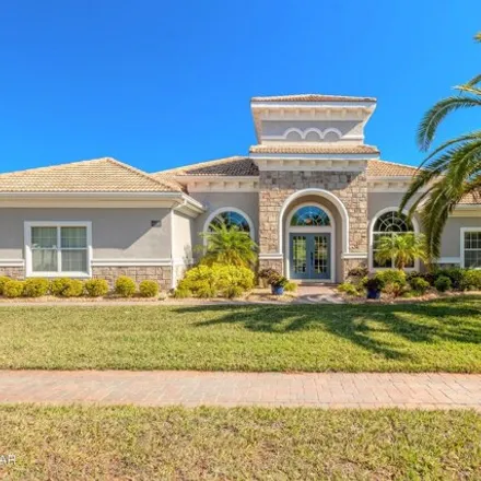 Buy this 4 bed house on 3531 Tuscany Reserve Boulevard in New Smyrna Beach, FL 32168