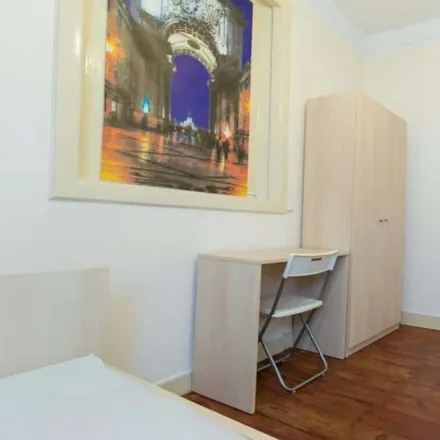 Rent this 7 bed room on Avenida 5 de Outubro in 1050-048 Lisbon, Portugal
