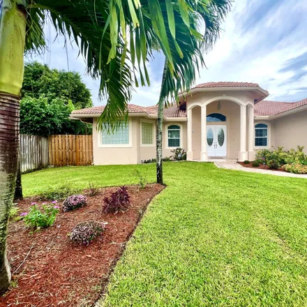 Rent this 4 bed house on 13620 Wellington Trace in Wellington, Palm Beach County