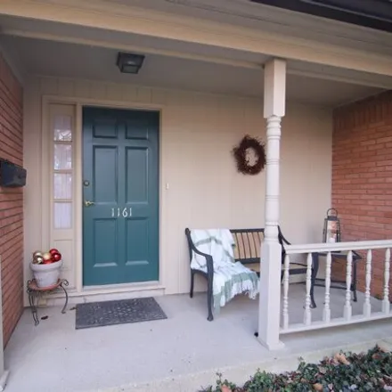 Buy this 2 bed townhouse on 1161 Canterbury Court in Indianapolis, IN 46260