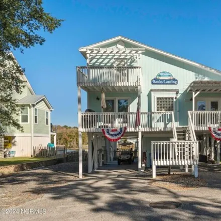 Rent this 4 bed house on 3058 East Yacht Drive in Oak Island, Brunswick County