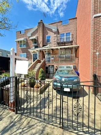 Buy this 4 bed townhouse on 47-48 48th Street in New York, NY 11377