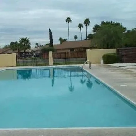 Rent this 3 bed townhouse on 1042 West Pace East Townhouses in Mesa, AZ 85202