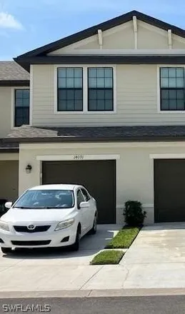 Buy this 2 bed townhouse on Oviedo Place in Lee County, FL