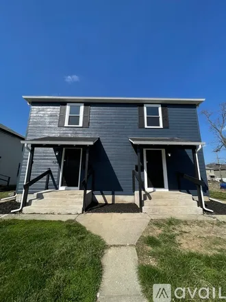 Rent this 2 bed duplex on 1290 E 25th Ave