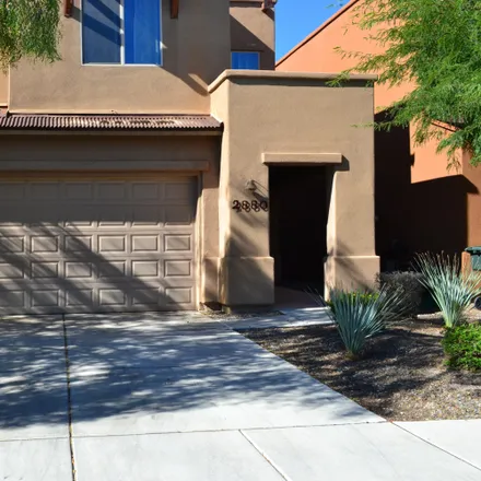 Rent this 3 bed loft on 2880 North Silkie Place in Tucson, AZ 85719