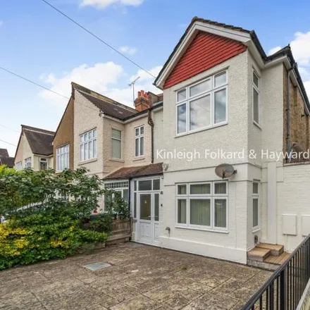 Rent this 3 bed apartment on 23 Alric Avenue in London, KT3 4JL