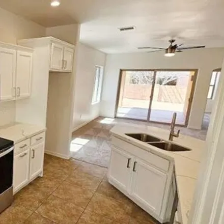 Buy this 4 bed house on 6038 Wych Elm Place in Tucson, AZ 85747