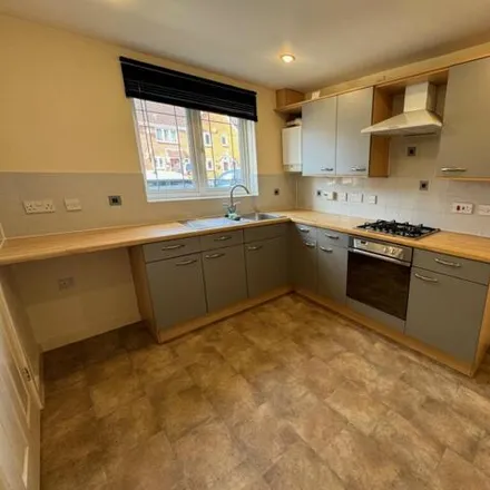 Rent this 3 bed townhouse on Hobby Close in Havant, PO8 9AY