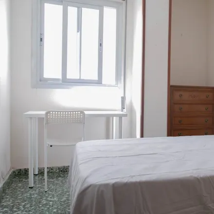 Rent this 6 bed room on Carrer del Ministre Lluís Mayans in 46019 Valencia, Spain