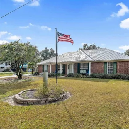 Buy this 4 bed house on 5353 Mississippi Avenue in Orange Beach, Baldwin County
