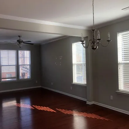 Rent this 3 bed townhouse on 1018 Summerhouse Road in Cary, NC 27519