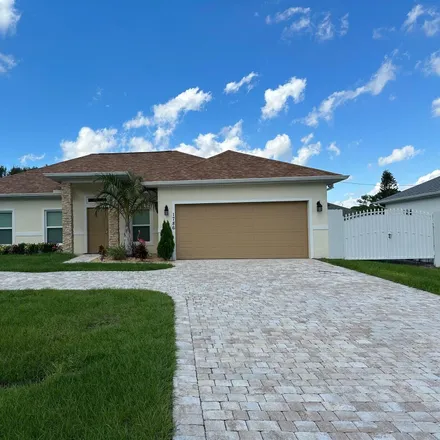 Buy this 3 bed house on 1786 Southwest Cashmere Boulevard in Port Saint Lucie, FL 34953