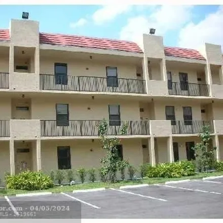 Rent this 2 bed condo on 6696 Coral Lake Drive in Margate, FL 33063