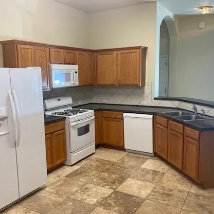 Rent this 3 bed house on Columbine Avenue in Cedar Park, TX
