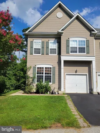 Rent this 4 bed townhouse on 23428 Aster Way in Lexington Park, MD 20619