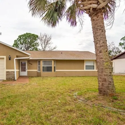Rent this 3 bed house on 4221 Piedras Street in Port Saint John, Brevard County