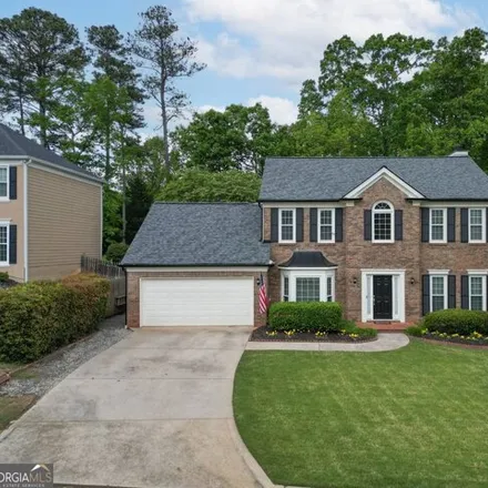 Buy this 3 bed house on 5070 Cinnabar Drive in Johns Creek, GA 30022