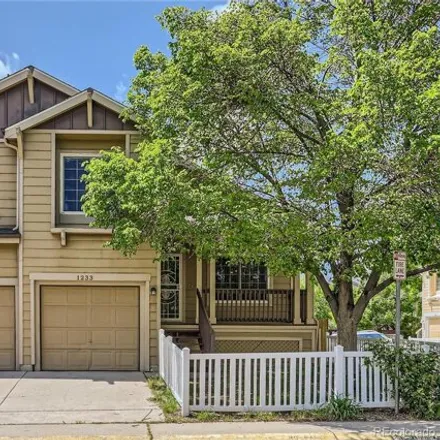 Buy this 4 bed house on 1233 S Chester St in Denver, Colorado