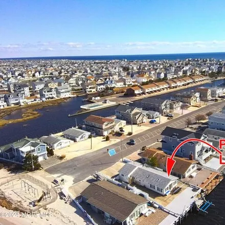 Rent this 4 bed house on 261 Bay Beach Way in Ocean Beach, Toms River