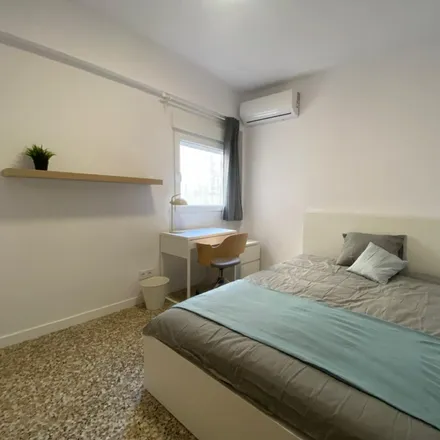 Rent this 4 bed room on Calle de Santiago García in 46100 Burjassot, Spain