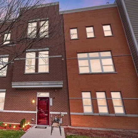 Buy this 4 bed townhouse on 5338-5360 West Hanson Avenue in Chicago, IL 60639