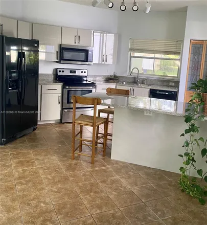 Rent this 4 bed house on 201 Northwest 207th Avenue in Pembroke Pines, FL 33029
