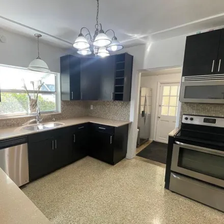 Rent this 3 bed house on 1545 Biarritz Dr in Miami Beach, FL 33141