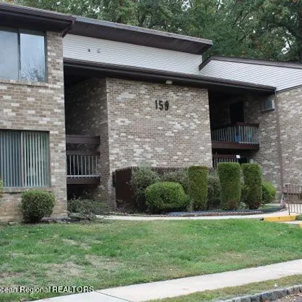 Buy this 2 bed condo on 140 Cross Slope Court in Whittier Oaks, Manalapan Township