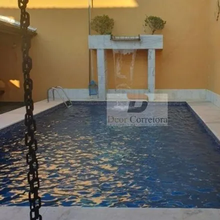 Buy this 4 bed house on Rua Marechal Eurico Gaspar Dutra in Canto do Forte, Praia Grande - SP