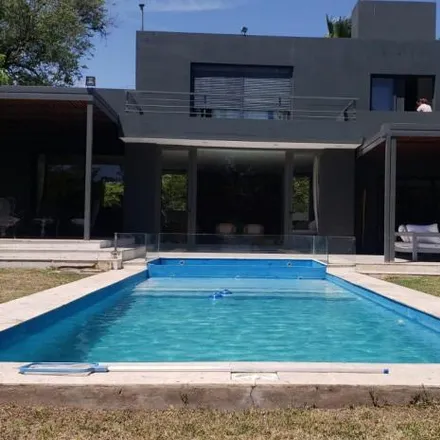 Rent this 3 bed house on La Macarena in Lomas Este, Villa Allende