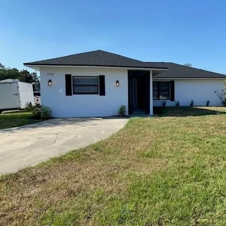Rent this 3 bed house on 1750 Mitten Terrace in Deltona, FL 32738