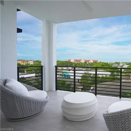 Rent this 2 bed condo on 111 Jasmine Circle in Naples, FL 34102