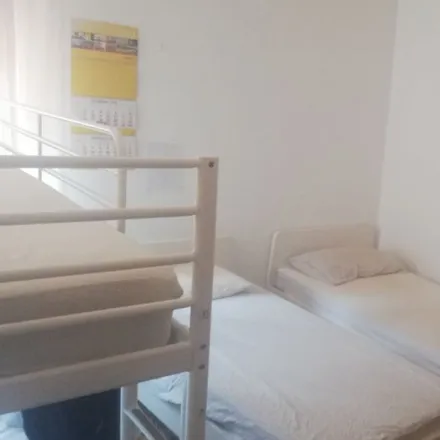 Rent this 4 bed room on Via Giovanni Rabino in 20099 Sesto San Giovanni MI, Italy
