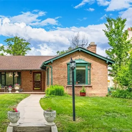 Buy this 4 bed house on Monaco Pkwy & E Colfax Ave in Monaco Parkway, Denver